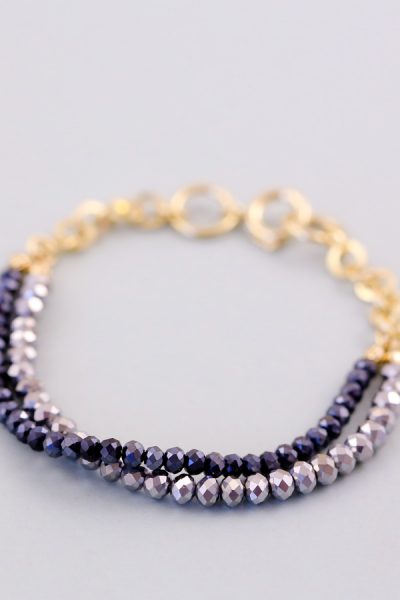 Elegant charm bracelet with sparkly, shimmering bead detail. Available in a variety of colours with gold & silver.