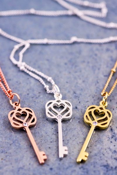 Delicate and alluring necklace with key charm pendant in silver with Swarovski detailing. Also available in gold and rose gold tone.