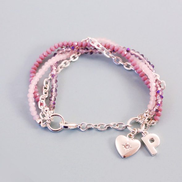 Pastel tone, versatile multistrand bracelet with pearlescent glass beads. Available in a variety of colours.